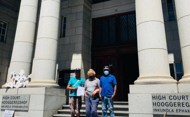 Small-scale fishers with the Strategic Lead at CPT high court